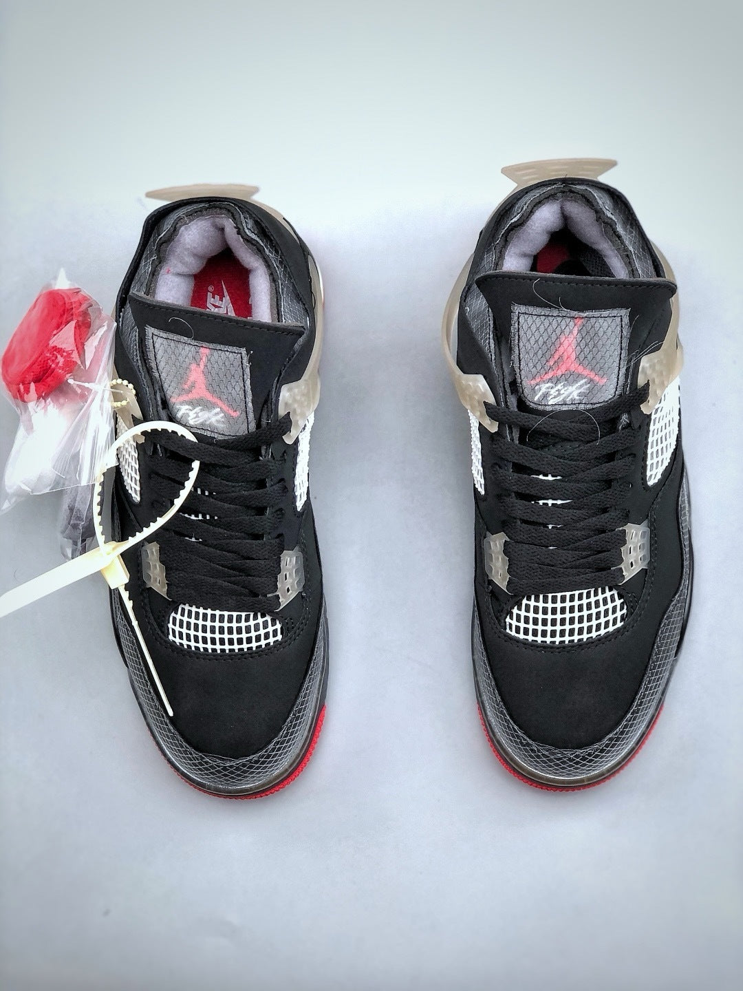 Air Jordan 4 x Off-White "Bred"